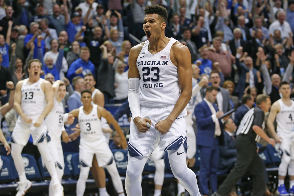 BYU forward Yoeli Childs (23) reacts after dunking against Gonzaga during the second half of an NCAA college basketball game Saturday, Feb. 22, 2020, in Provo, Utah. (AP Photo/Rick Bowmer)