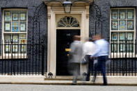 People arrive at 10 Downing Street in London, Monday, May 23, 2022. The general public is awaiting the release of Sue Gray's report into COVID lockdown breaches across Whitehall, the so called "Partygate". (AP Photo/Frank Augstein)