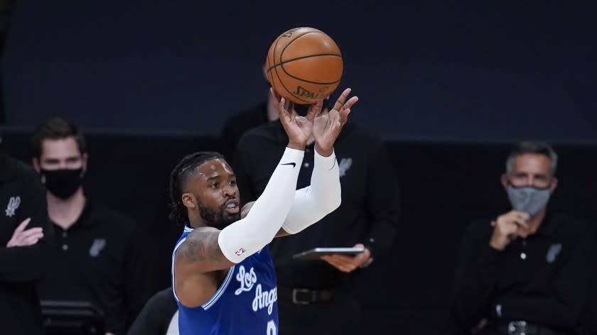 Los Angeles Lakers guard Wesley Matthews takes a shot during the first half of an NBA basketball game against the San Antonio Spurs Thursday, Jan. 7, 2021, in Los Angeles. (AP Photo/Ashley Landis)