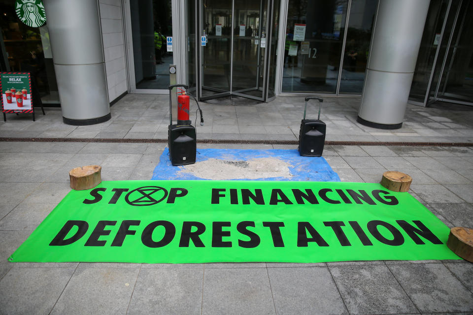 LONDON, UNITED KINGDOM - 2019/11/15: An Extinction Rebellion banner lies outside BlackRock offices during a protest against the climate crisis and destruction of the Amazonia fires. (Photo by Steve Taylor/SOPA Images/LightRocket via Getty Images)