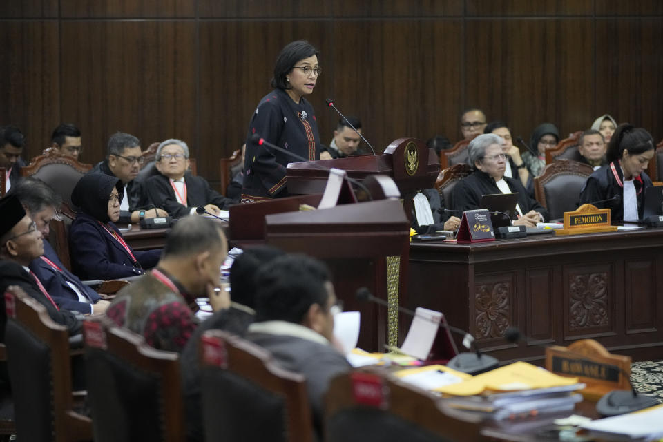 Indonesian Finance Minister Sri Mulyani Indrawati delivers her statement during a hearing on the presidential election result dispute at the Constitutional Court in Jakarta, Indonesia, Friday, April 5, 2024. (AP Photo/Dita Alangkara)