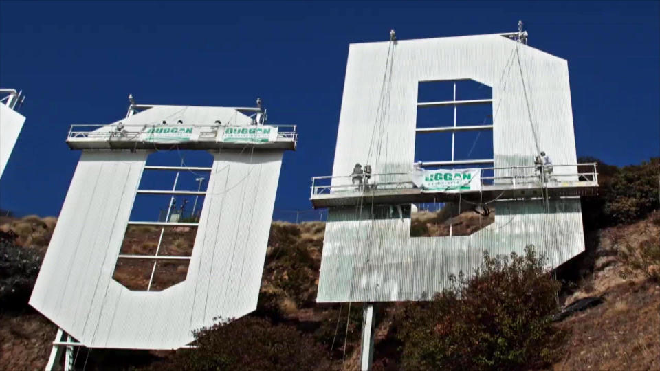 The Hollywood sign having some work done.  / Credit: CBS News