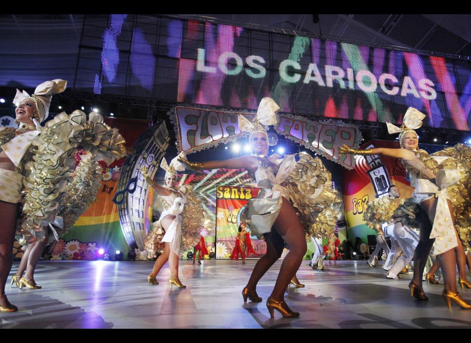 Tenerife carnival 'comparsa' dancers perform on the stage where the Queen of the Carnival of the Santa Cruz is elected, on the Spanish Canary island of Tenerife, February 15, 2012. (DESIREE MARTIN/AFP/Getty Images)