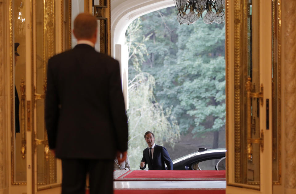 Dutch Prime Minister Mark Rutte, center, arrives for a meeting with Romanian President Klaus Iohannis at the Cotroceni Presidential Palace in Bucharest, Romania, Wednesday, Sept. 12, 2018. Rutte is on a one day official visit to Romania. (AP Photo/Vadim Ghirda)