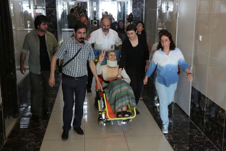 Pro-Kurdish Peoples' Democratic Party (HDP) lawmaker Leyla Guven, who ends her hunger strike after a call from jailed militant leader Abdullah Ocalan, leaves her home to go to hospital in Diyarbakir, Turkey, May 26, 2019. REUTERS/Sertac Kayar