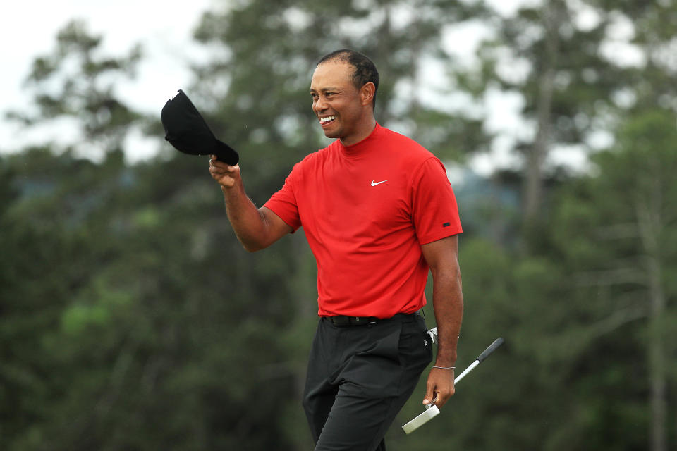 AUGUSTA, GEORGIA - APRIL 14: Tiger Woods of the United States celebrates after sinking his putt on the 18th green to win during the final round of the Masters at Augusta National Golf Club on April 14, 2019 in Augusta, Georgia. (Photo by Mike Ehrmann/Getty Images)