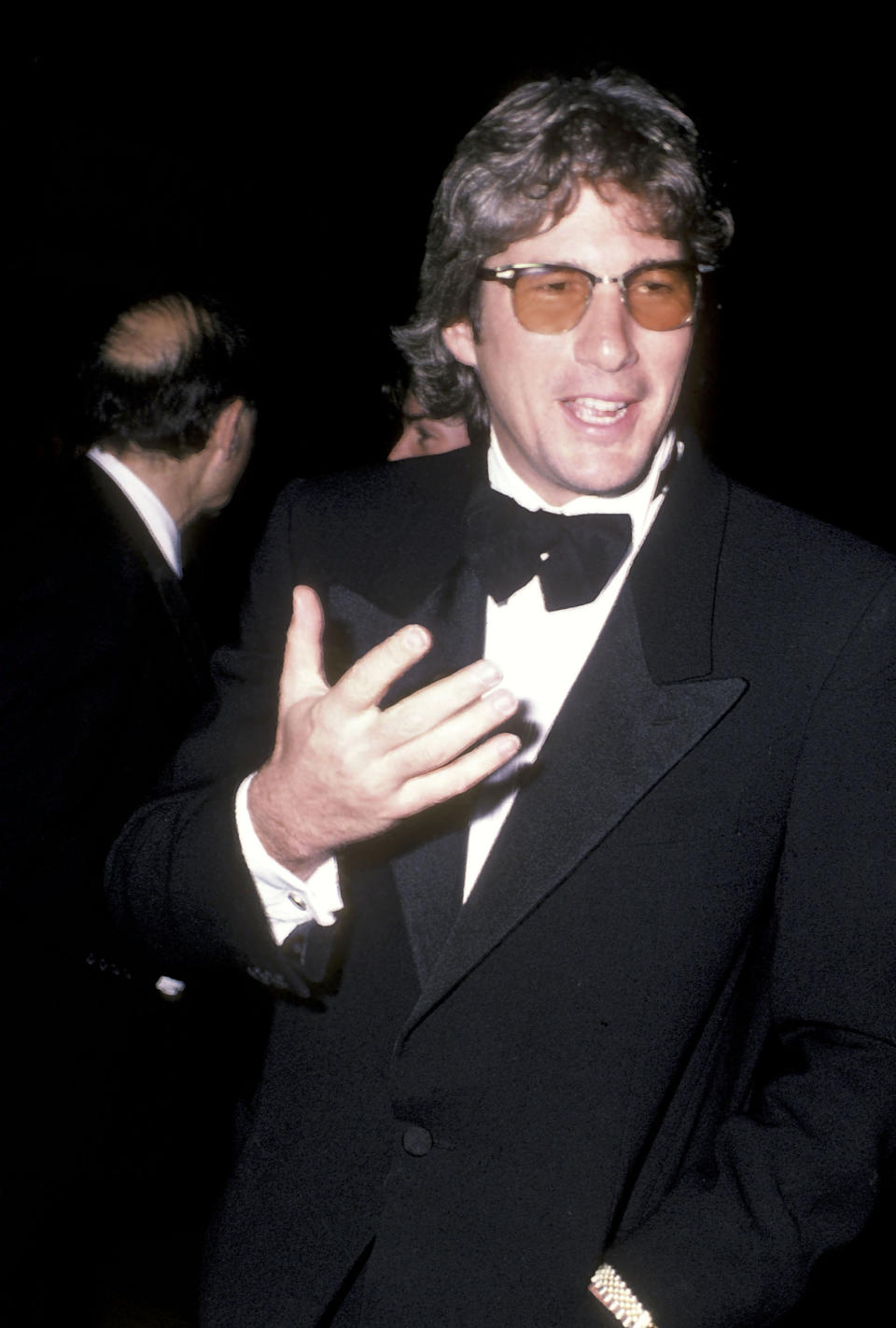 Close-up of Richard in a tux and sunglasses