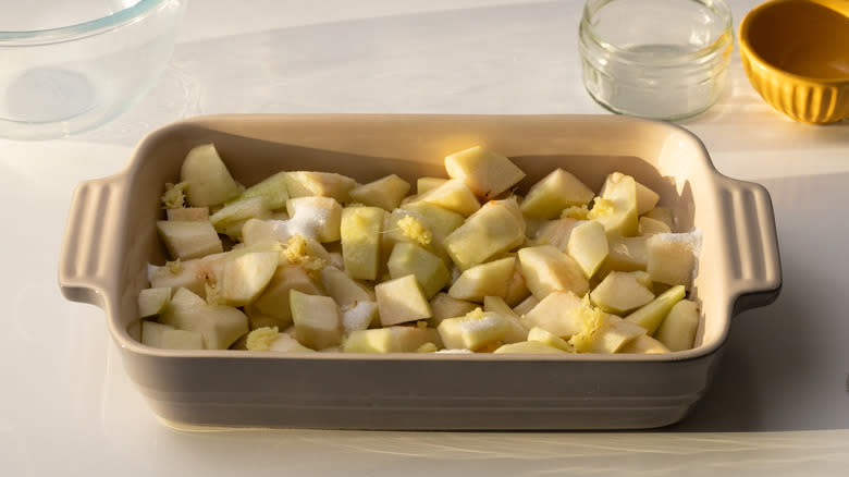 mixing pear with crisp ingredients