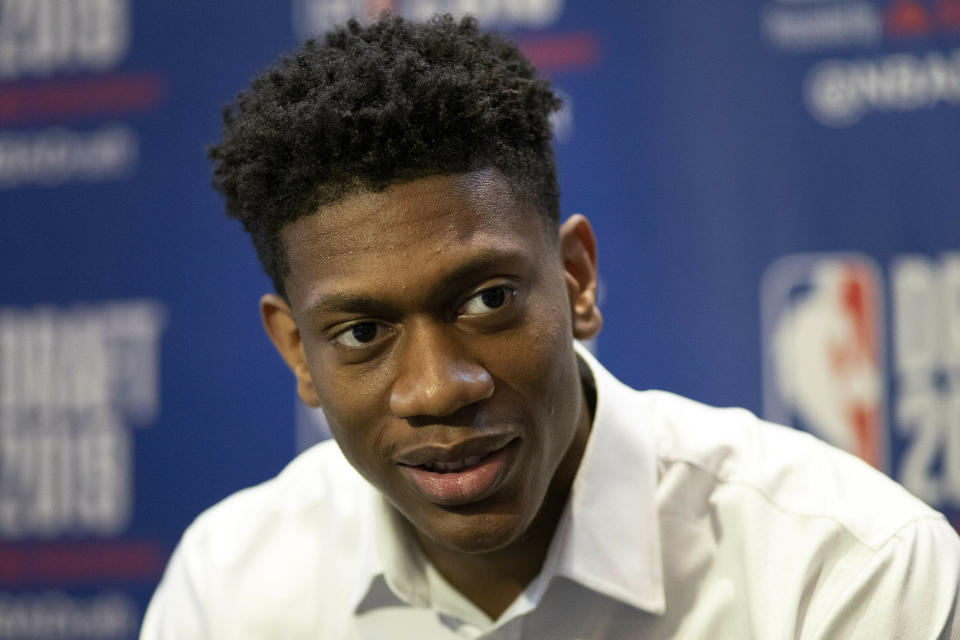 De'Andre Hunter, a sophomore basketball player from Virginia, attends the NBA Draft media availability, Wednesday, June 19, 2019, in New York. The draft will be held Thursday, June 20. (AP Photo/Mark Lennihan)