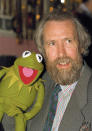 FILE - In this Feb. 1988 file photo, Jim Henson, creator of the Muppets, poses with Kermit the Frog. This first episode of “Sesame Street” aired in the fall of 1969. (AP Photo/File)