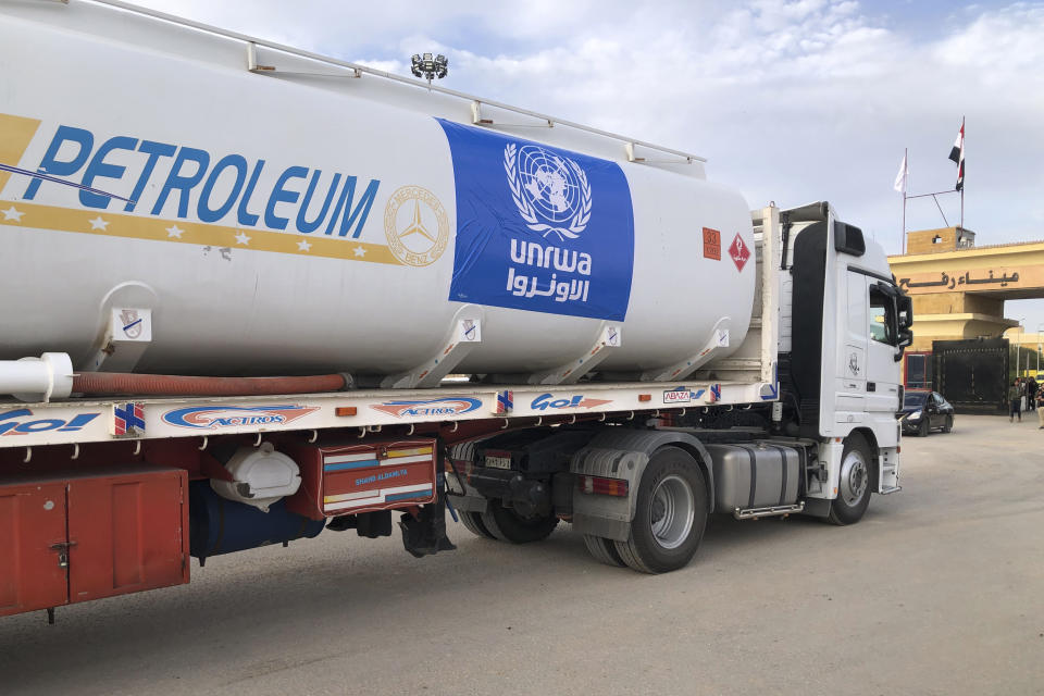 An Egyptian truck delivering fuel to the Gaza Strip waits to cross the Rafah border crossing between the Gaza Strip and Egypt, in Rafah, Egypt, Wednesday, Nov.22, 2023. (AP Photo)