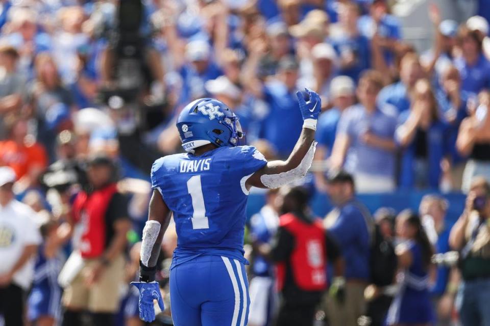 Kentucky running back Ray Davis celebrates a touchdown against Florida during Saturday’s game at Kroger Field.