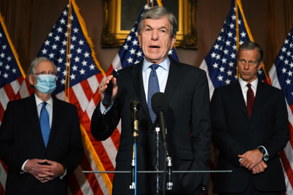 WASHINGTON, DC - DECEMBER 08: Sen. Roy Blunt, (R-MO) speaks alongside Senate Majority Leader Mitch McConnell, (R-KY) (L) and Sen. John Thune, (R-SD) to the media after the Republican's weekly senate luncheon in the US Capitol on December 8, 2020 in Washington, DC.  McConnell spoke on the ongoing Coronavirus relief package legislation.  (Photo by Kevin Dietsch-Pool/Getty Images)