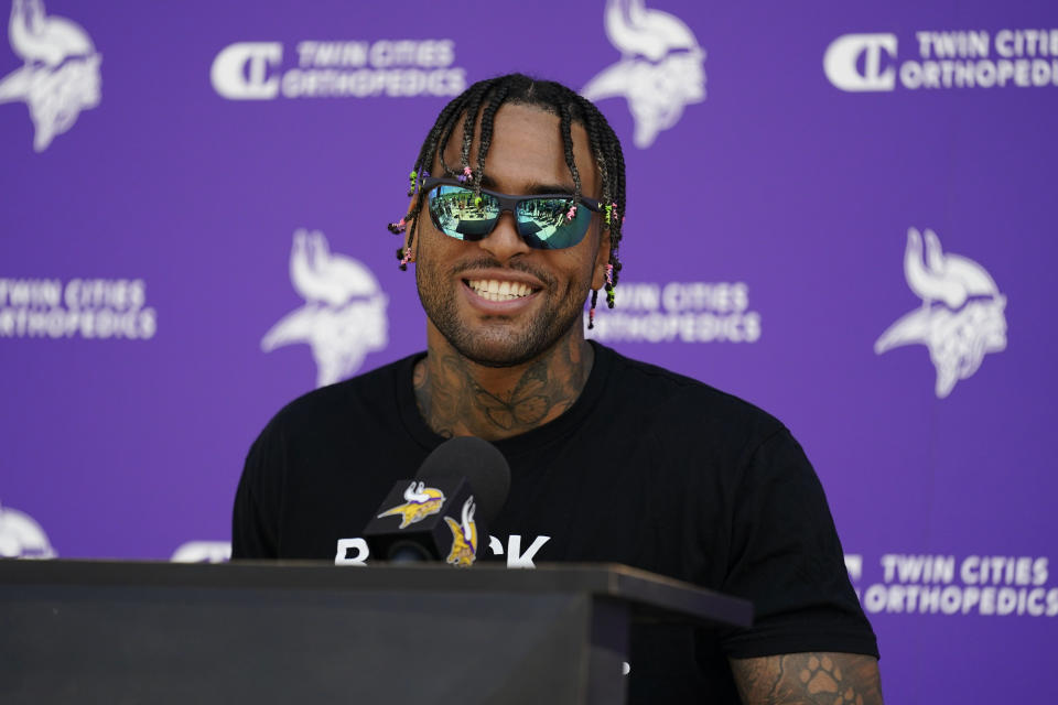 Minnesota Vikings tight end Irv Smith Jr. (84) speaks to the media during the NFL football team's training camp in Eagan, Minn., Wednesday, July 27, 2022. (AP Photo/Abbie Parr)