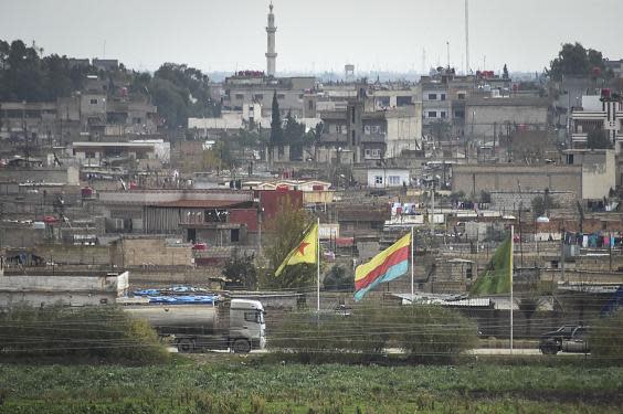 Nusaybin district, Mardin, Turkey, where flags of the Kurdish YPG over the border in Qamishli, Syria (Getty)