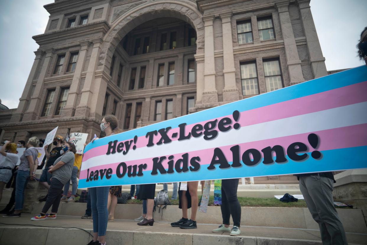 Transgender youth, parents and several Democratic lawmakers rally at the south steps of the Texas Capitol on Wednesday evening, criticizing several anti-LGBTQ bills winding their way through the 87th Legislature. [BOB DAEMMRICH for STATESMAN]