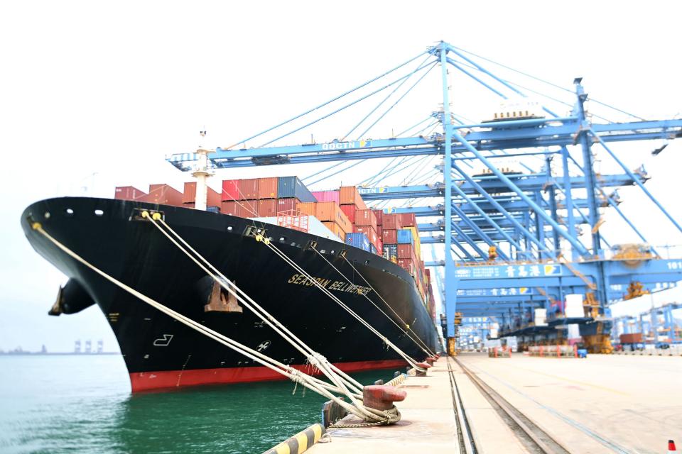 QINGDAO, CHINA - JUNE 9, 2022 - Freighters load foreign trade containers at a fully automated terminal in Qingdao Port, East China's Shandong Province, June 9, 2022. China's imports and exports totaled 16.04 trillion yuan in the first five months of this year, up 8.3 percent from the same period last year, according to data released by the General Administration of Customs. (Photo credit should read CFOTO/Future Publishing via Getty Images)