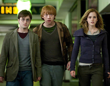 <p>Friends 'til the end, the grown up wizarding trio battle it out to destroy Lord Voldemort in " Harry Potter and the Deathly Hallows Part 1." (L-R) Daniel Radcliffe as Harry Potter, Rupert Grint as Ron Weasley and Emma Watson as Hermione Granger.</p>