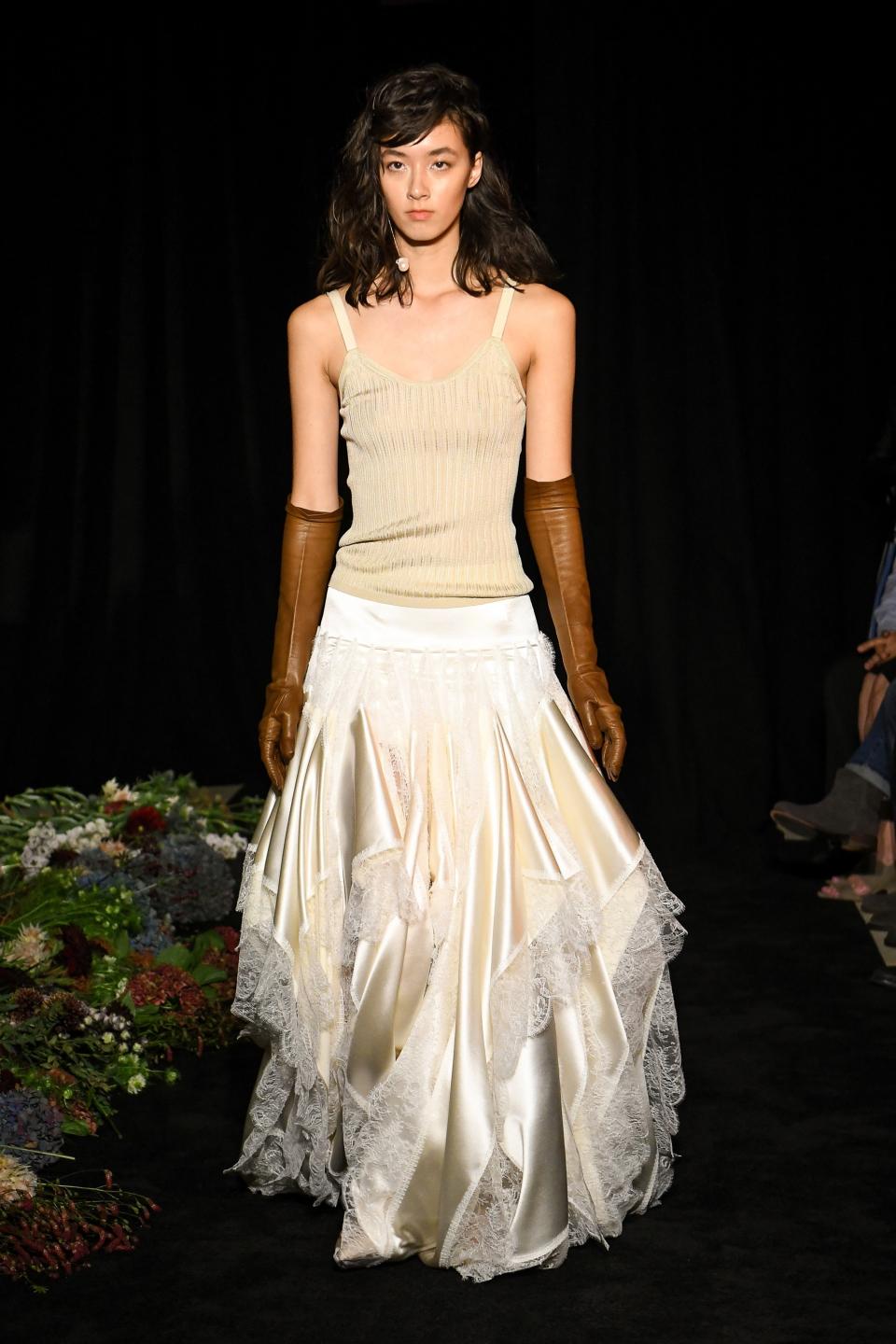 Separates remain a big trend in bridal. Danielle Frankel styled this handkerchief satin skirt with a knit tank.