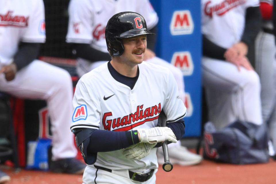 Cleveland Guardians designated hitter Kyle Manzardo (9) walks to home plate before his first MLB at-bat in the second inning against the Detroit Tigers on Monday at Progressive Field.