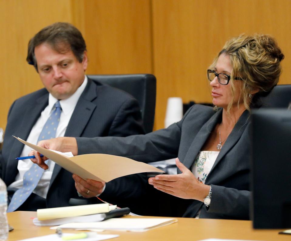 Debra Tuomey, right, in another death-penalty case in 2019, is saying Polk County jail policies forcing all mail to be scanned and prohibiting attorneys from using their own laptops are an impediment to her defense.