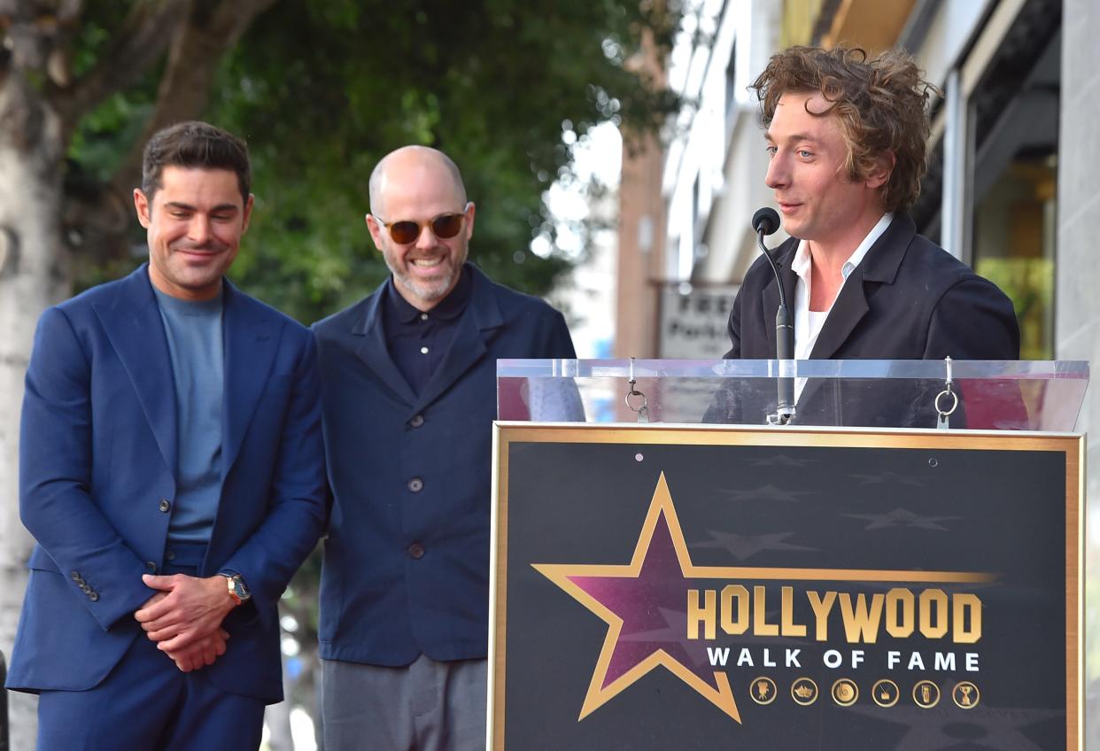 Zac Efron, from left, Sean Durkin and "The Iron Claw" co-star Jeremy Allen White attend a ceremony honoring Efron with a star on the Hollywood Walk of Fame on Dec. 11, 2023, in Los Angeles.