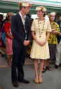 <p>The Duchess spent a day in the Solomon Islands in a primrose yellow dress featuring a broderie anglaise design. She teamed the look with Stuart Weitzman wedges. <em>[Photo: Getty]</em> </p>