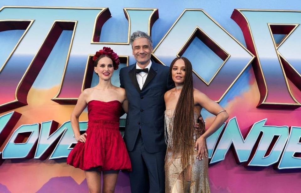 Director Taika Waititi and cast members Natalie Portman and Tessa Thompson attend a premiere of Marvel Studios’ ‘Thor: Love and Thunder’ in London July 5, 2022. — Reuters pic