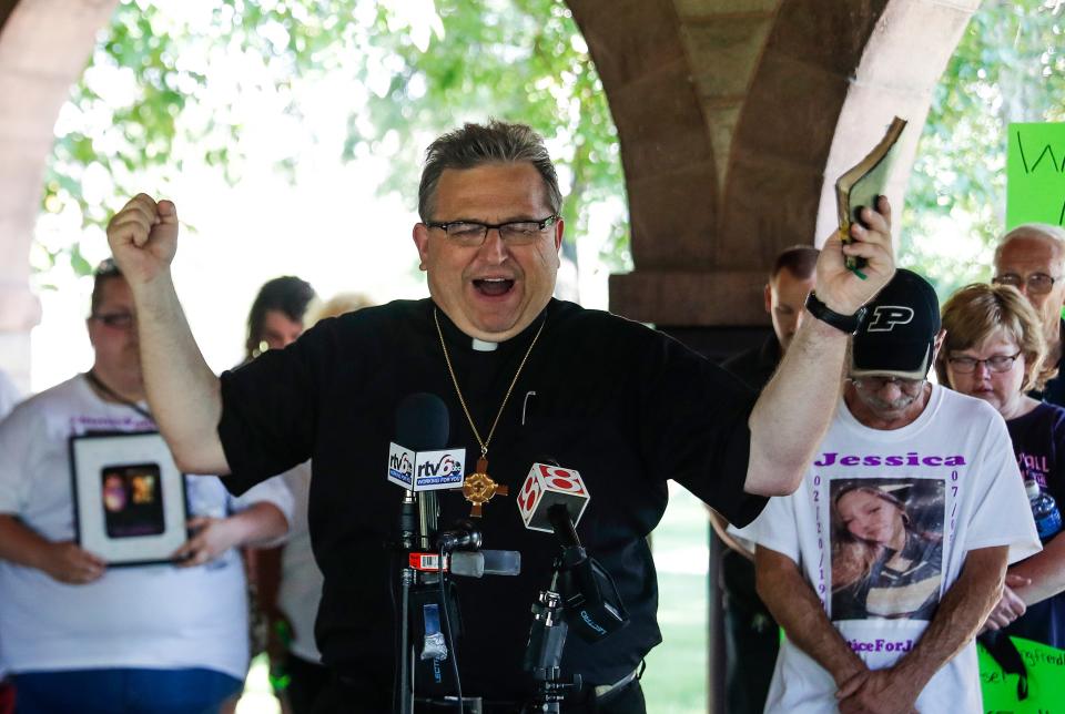 Rev. Mark J. Powell says a prayer during a rally to demand justice for Jessica Doty-Whitaker at Military Park in downtown Indianapolis, Saturday, July 25, 2020. Doty-Whitaker was shot while walking on the canal in the early morning of July 5.