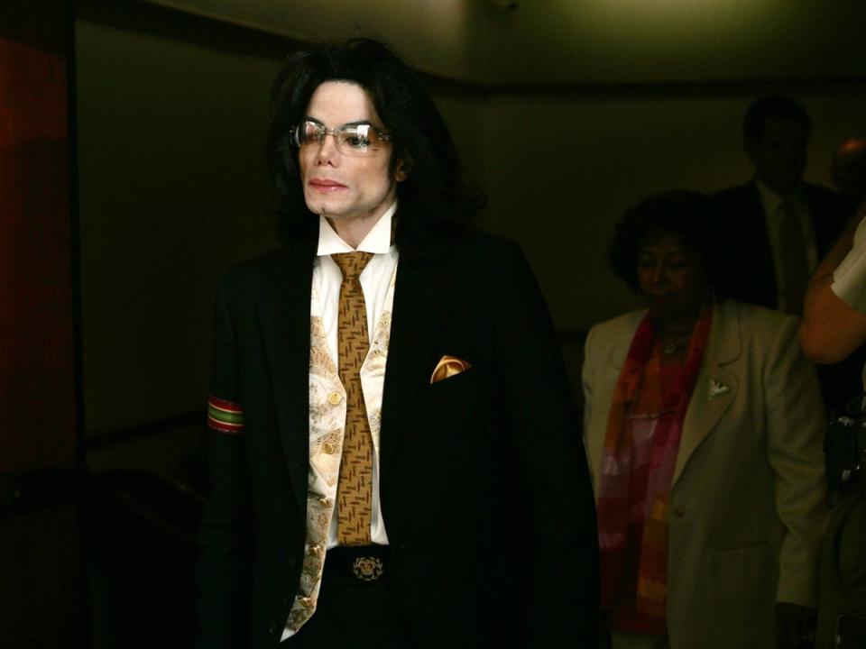 Michael Jackson leaves the courtroom in June 2005 on a break at the Santa Barbara County Courthouse for the second day of closing arguments in his child molestation trial in Santa Maria (AFP/Getty)