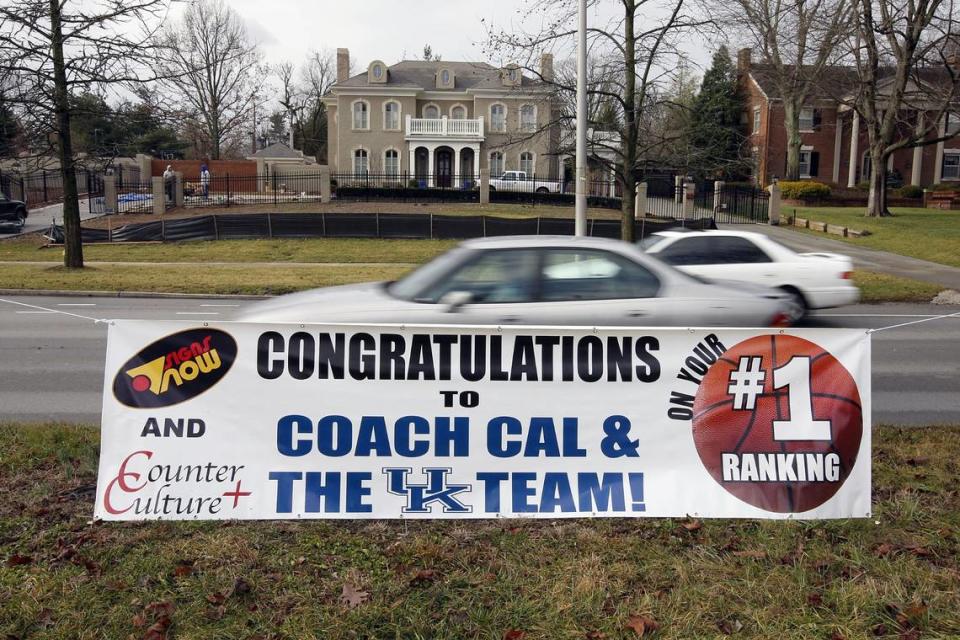 A sign congratulating UK coach John Calipari and the basketball team on being ranked No. 1 in the polls was placed in the median in front his Richmond Road house Jan., 25, 2010.