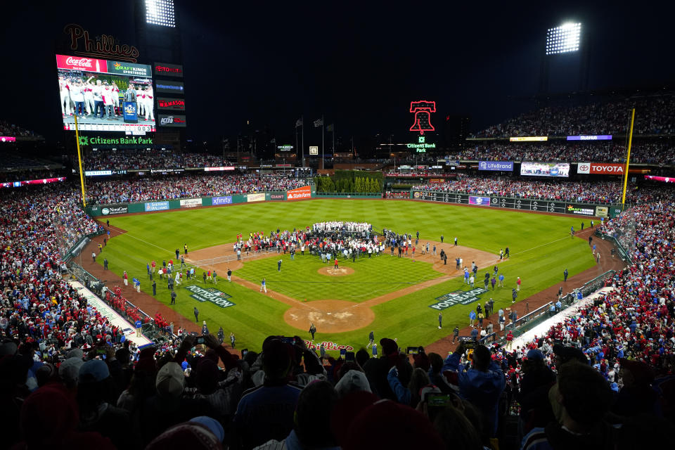 Philadelphia Phillies celebrate after winning the baseball NL Championship Series in Game 5 against the San Diego Padres on Sunday, Oct. 23, 2022, in Philadelphia. (AP Photo/Matt Rourke)