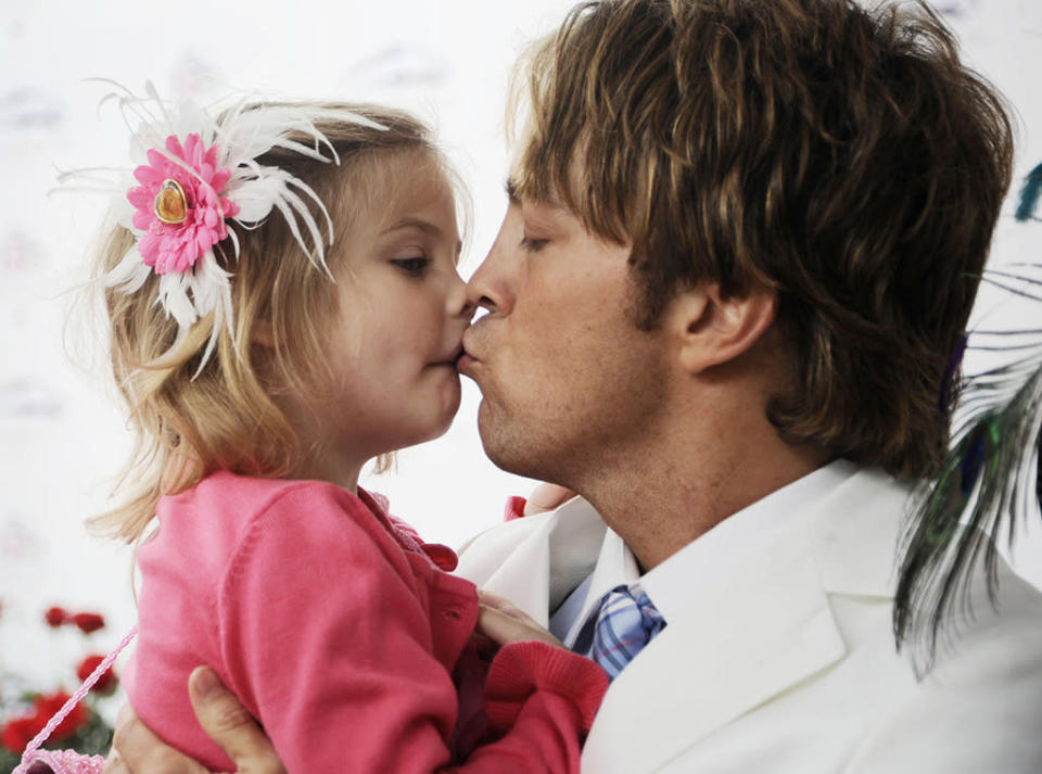 In 2010, 3½-year-old Dannielynn made her Kentucky Derby debut wearing flowers in her blond hair. The little girl was already famous, both because of her mom — who died of a drug overdose when Dannielynn was just 5 months old — and because of the subsequent custody battle between Birkhead and Howard K. Stern, who was initially listed as Dannielynn’s father on her birth certificate. In April 2007, DNA results proved that Birkhead was the girl’s father. (Photo: Jeff Gentner/Getty Images) 