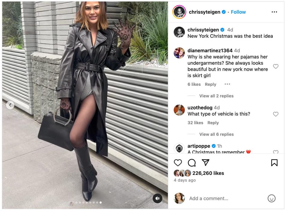 Chrissy Teigen wears a trench coat over gray underwear in New York City.