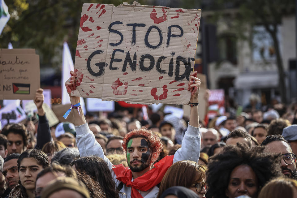 Protesters take part during a demonstration organized by the "National Collective for a just and lasting peace between Palestinians and Israelis" in Paris, Sunday, Oct. 22, 2023. (AP Photo/Aurelien Morissard)