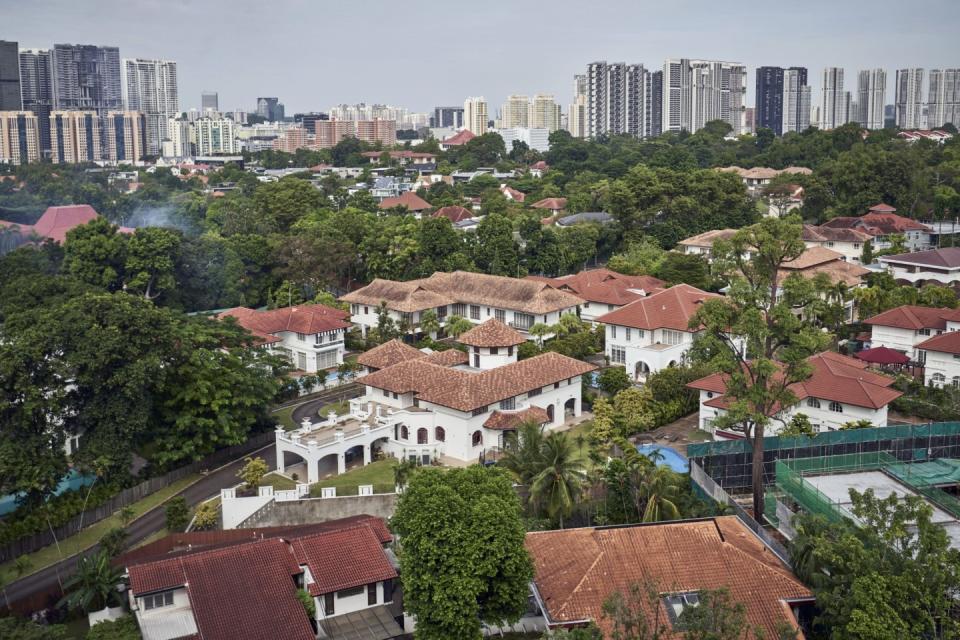 Private homes in the Tanglin area in Singapore. Housing prices are rising, driven in part by an influx of China-born buyers. Photographer: Lauryn Ishak/Bloomberg