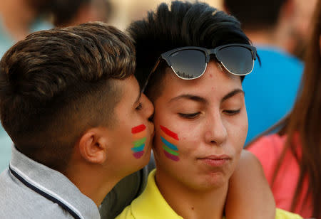 People celebrate after the Maltese parliament voted to legalise same-sex marriage on the Roman Catholic Mediterranean island, in Valletta, Malta July 12, 2017. REUTERS/Darrin Zammit Lupi