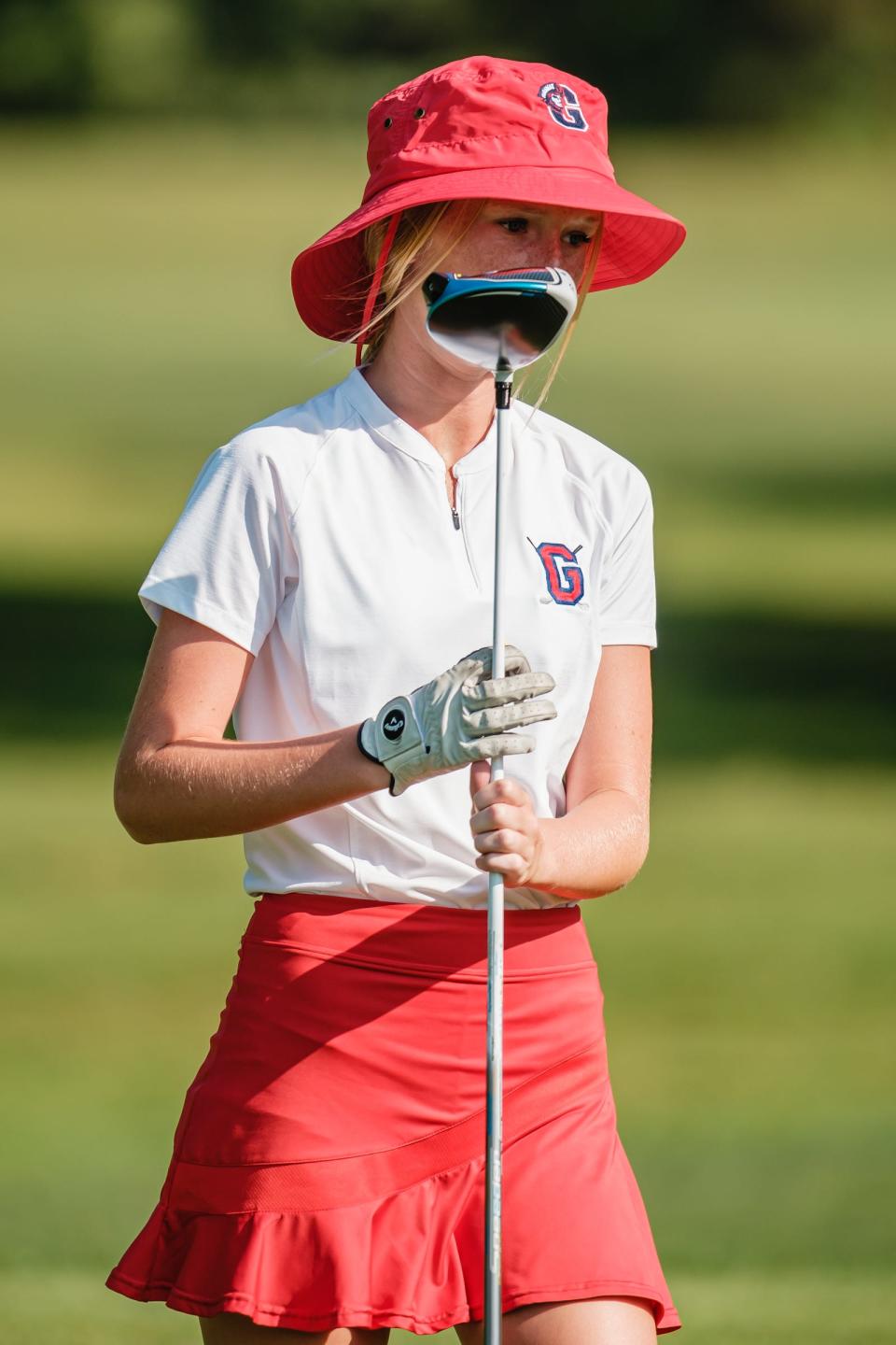 Hannah Steiner returns to her golf bag after a tee shot during the Inter-Valley Conference Girls Preseason Tournament last season at Wilkshire Golf Course in Bolivar. Steiner won the girls 16-18-year-old division of the First National Bank Junior Golf Tour regular season finale on Thursday.