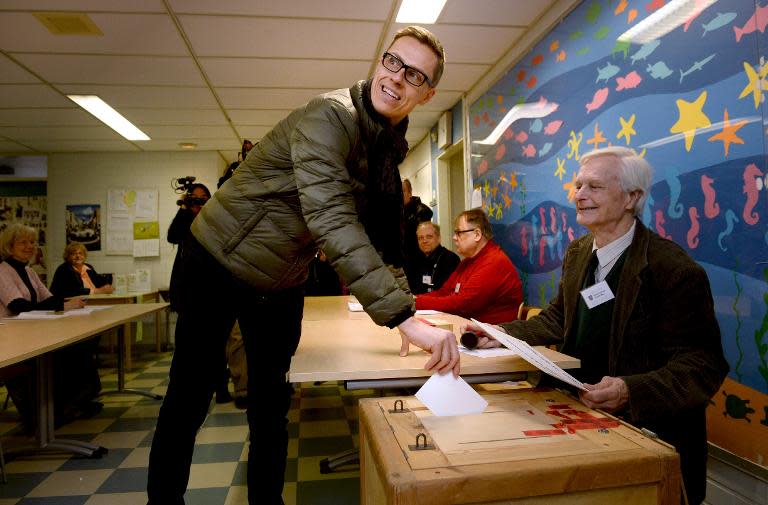 Finnish Prime Minister Alexander Stubb casts his vote in Espoo, Finland on April 19, 2015