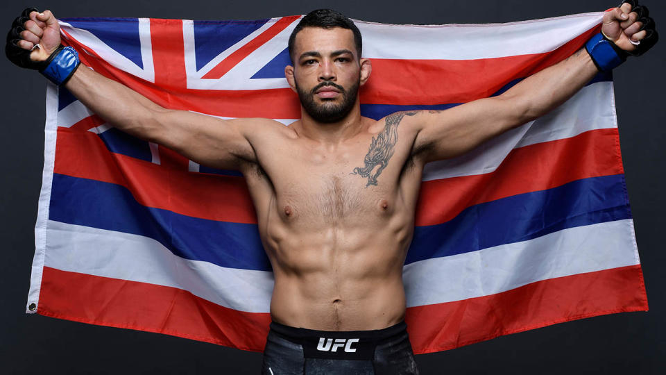 Dan Ige poses backstage after victory over Danny Henry during the UFC Fight Night event in London. (Photo by Mike Roach/Zuffa LLC/Zuffa LLC via Getty Images)