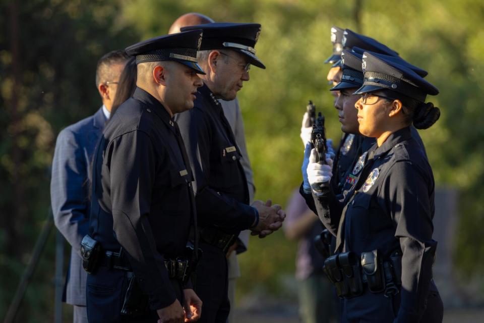 LAPD Chief Michel Moore inspects Los Angeles Police Academy Class at a graduation ceremony at LAPD Academy.