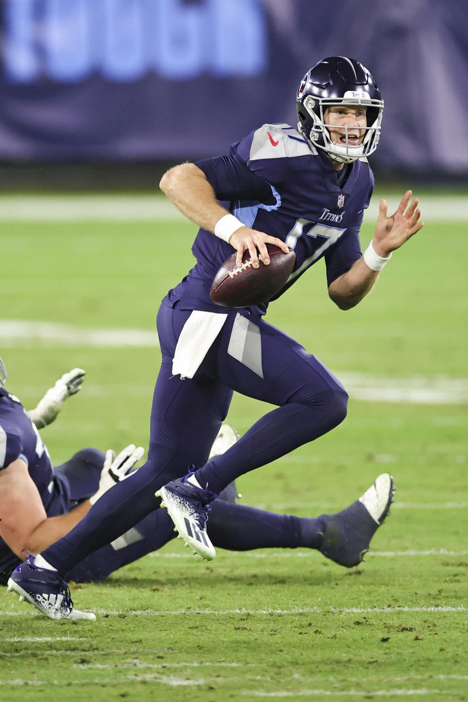 Tennessee Titans quarterback Ryan Tannehill (17) looks downfield for a receiver in an NFL game against the Indianapolis Colts, Thursday, Nov. 12, 2020 in Nashville, Tenn. The Colts defeated the Titans 34-17. (Margaret Bowles via AP)