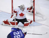 Amanda Kessel of the U.S. hits the goalpost. REUTERS/Brian Snyder