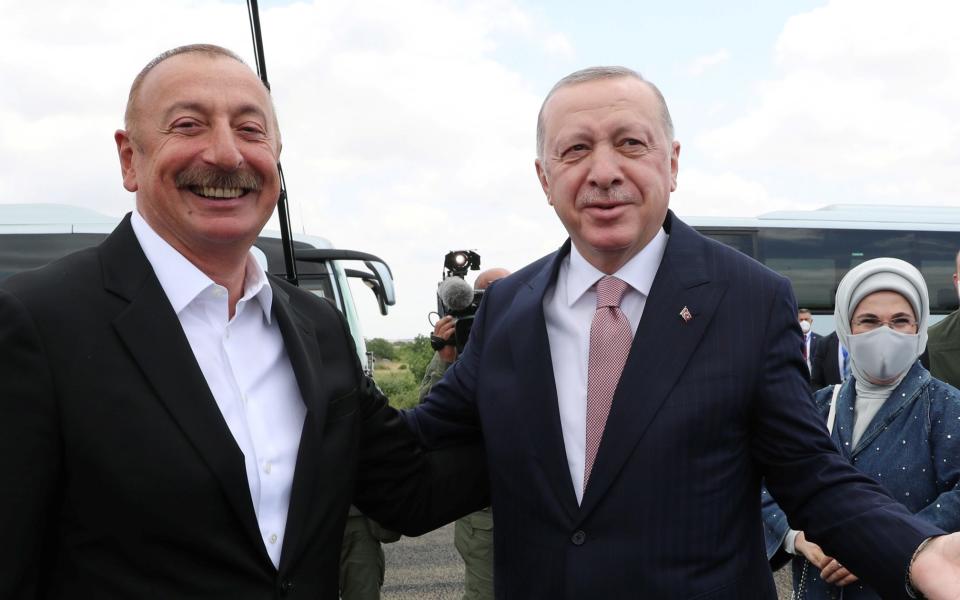 Turkey's President Tayyip Erdogan meets with Azerbaijan's President Ilham Aliyev in the Karabakh region, in June - Reuters