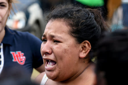 A relative of inmates of Palmasola prison reacts after a violent episode inside the prison in Santa Cruz, Bolivia, March 14, 2018. REUTERS/Rodrigo Urzagasti