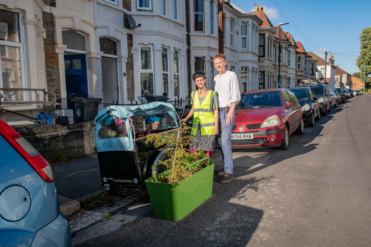 Anna and Mark Cordle with their DIY bike stand in Bristol. (SWNS)