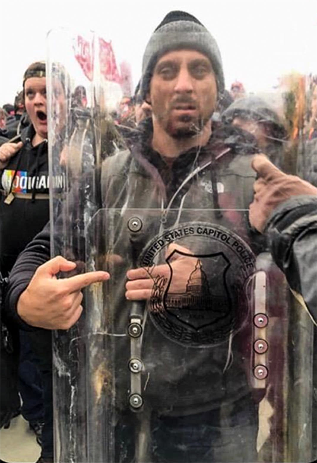 Thomas Sinbick with a U.S. Capitol Police Shield on Jan. 6, 2021. (Department of Justice)