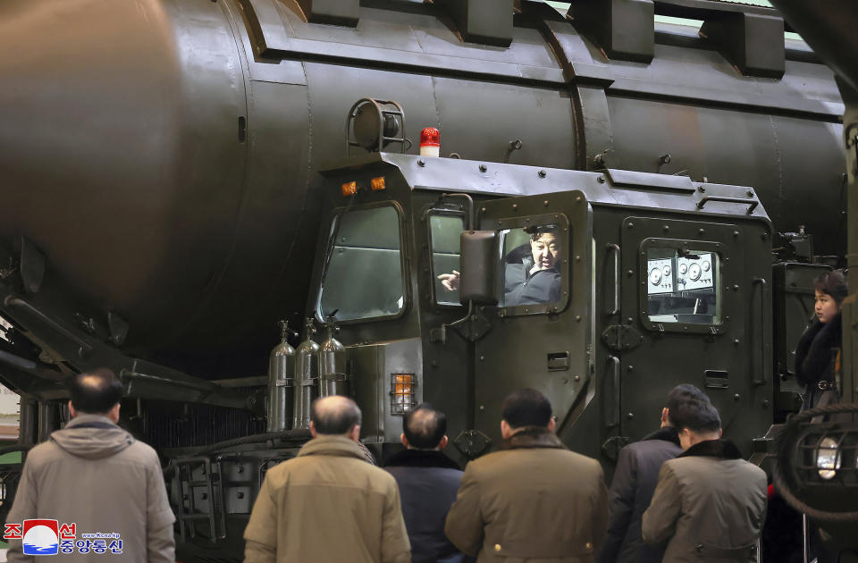 In this undated photo provided on Friday, Jan. 5, 2024, by the North Korean government, North Korean leader Kim Jong Un, top center, with his daughter, far right, visits a factory that produces transport erector launchers in North Korea. Independent journalists were not given access to cover the event depicted in this image distributed by the North Korean government. The content of this image is as provided and cannot be independently verified. Korean language watermark on image as provided by source reads: "KCNA" which is the abbreviation for Korean Central News Agency. (Korean Central News Agency/Korea News Service via AP)