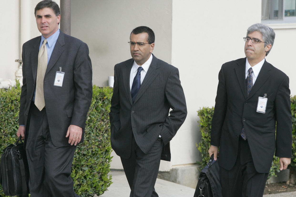 SANTA MARIA, UNITED STATES:  British journalist Martin Bashir (C) arrives with Ted Boutros(R), Bashir's attorney and Henry Hoberman, an attorney for ABC television at the Santa Barbara County Superior Court in Santa Maria, CA, 01 March 2005 to be the first witnesses to be called at Michael Jackson's child sex abuse trial. Bashir made the documentary 