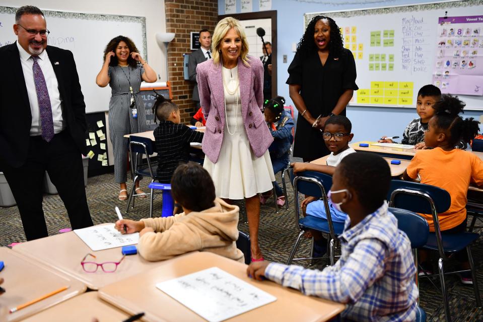 Jill Biden wishes "Happy birthday!" to third grader Daniel Neal, bottom right, at Sarah Moore Greene Magnet Academy.